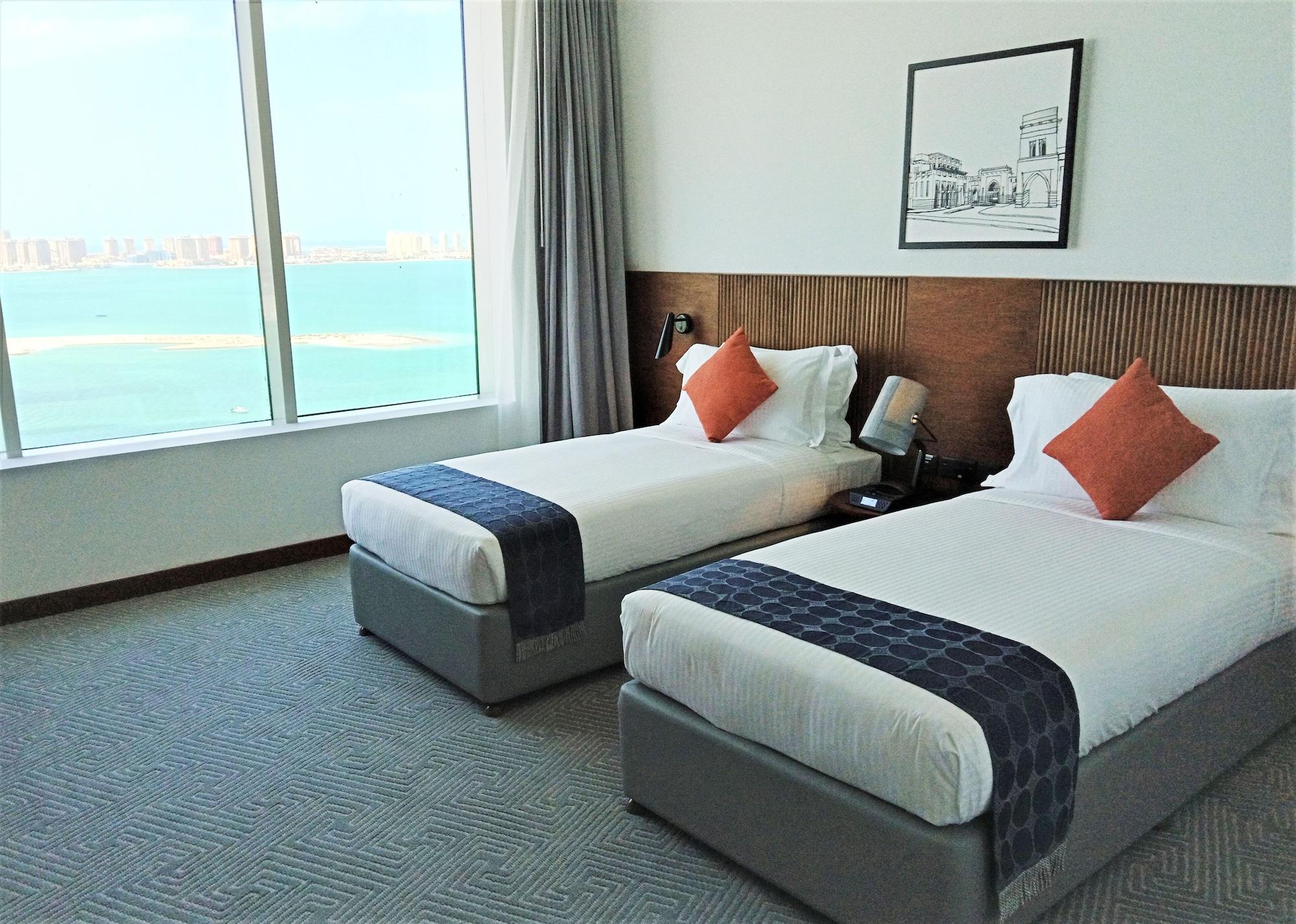 Somerset West Bay Doha Exterior foto Deluxe Room